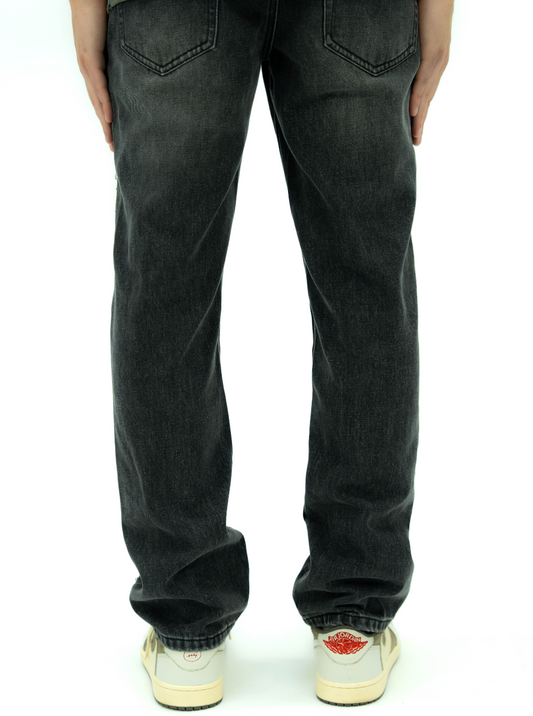 Person wearing black jeans 